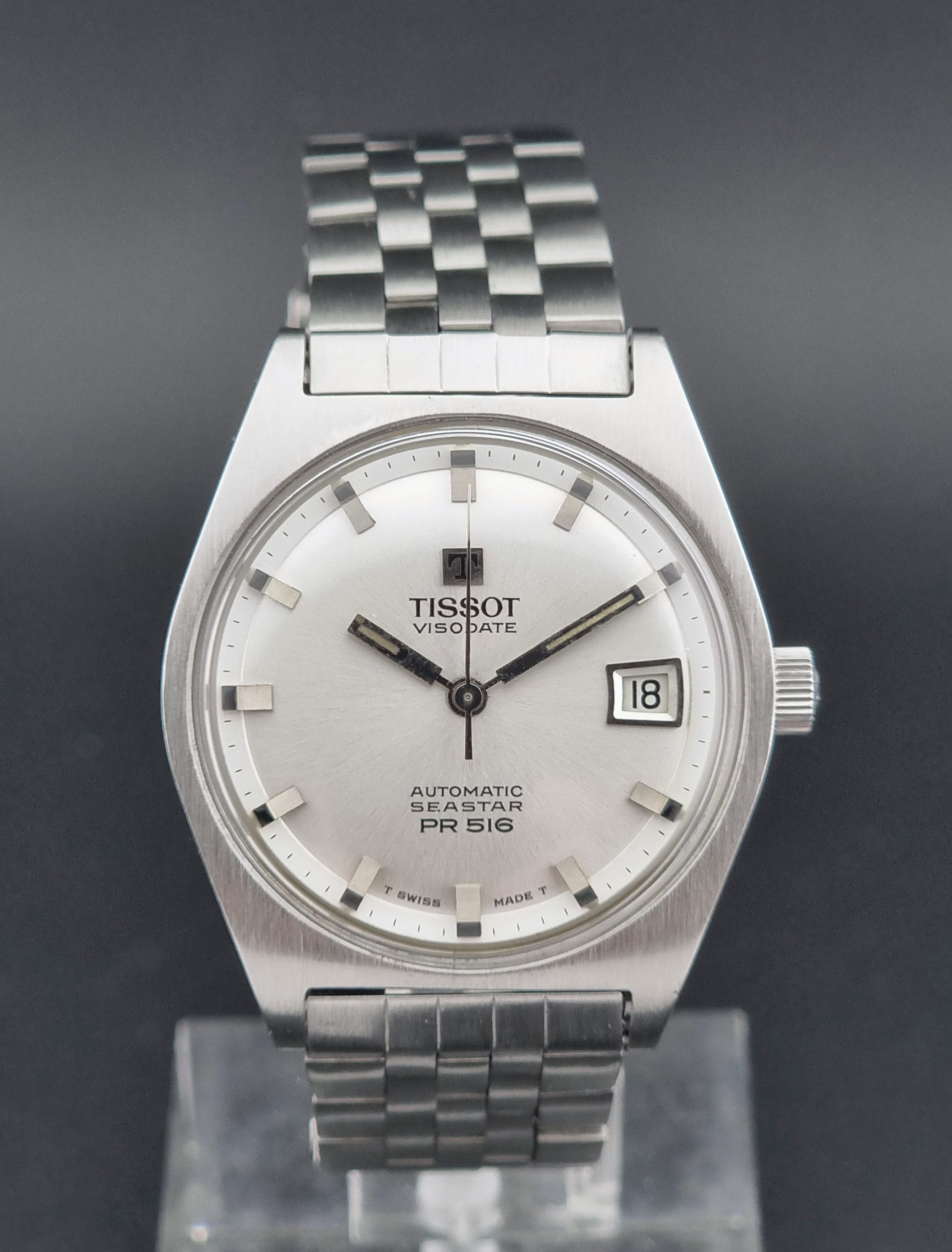 Tissot Seastar Visodate watch on a dark background
