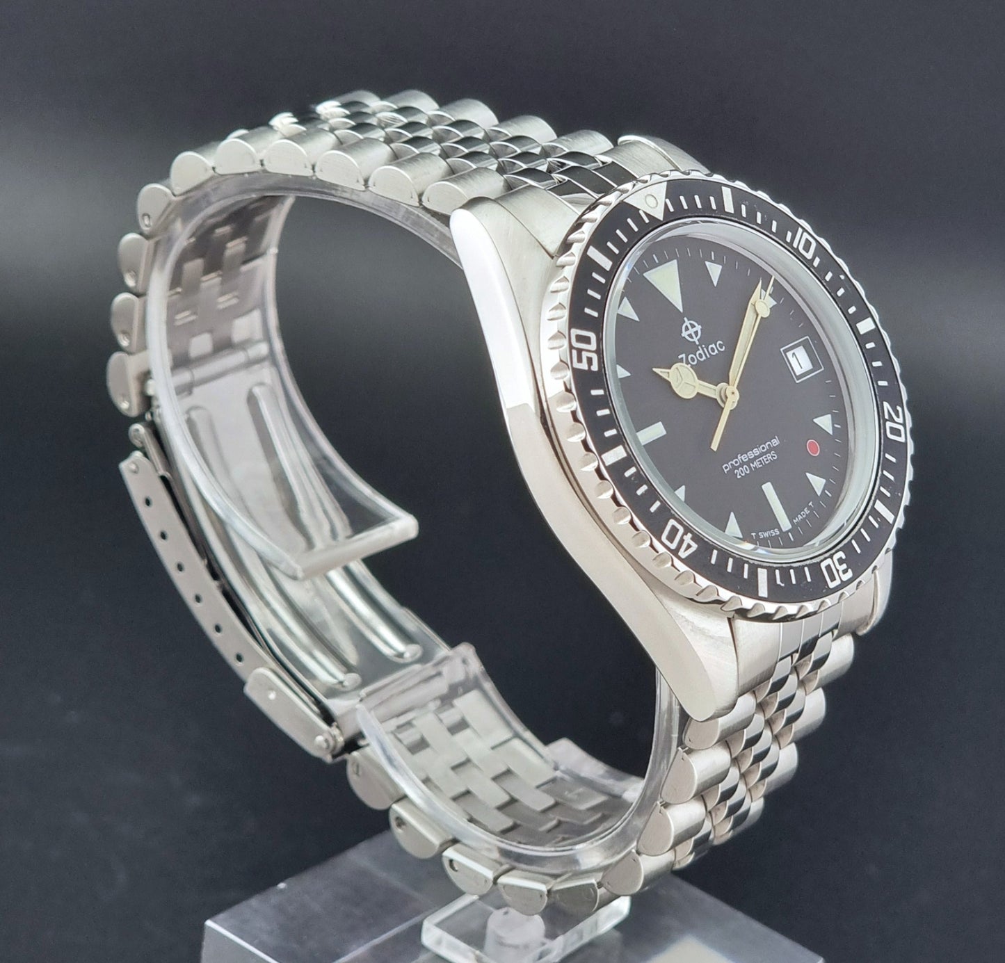 Vintage Zodiac Wristwatch 113.21.03 Quartz with black dial on a dark textured background side profile view