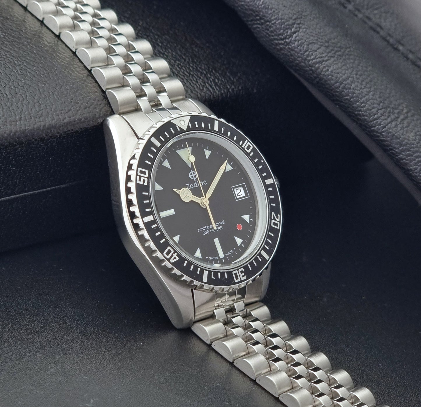 Vintage Zodiac Wristwatch 113.21.03 Quartz with black dial on a dark textured background side view
