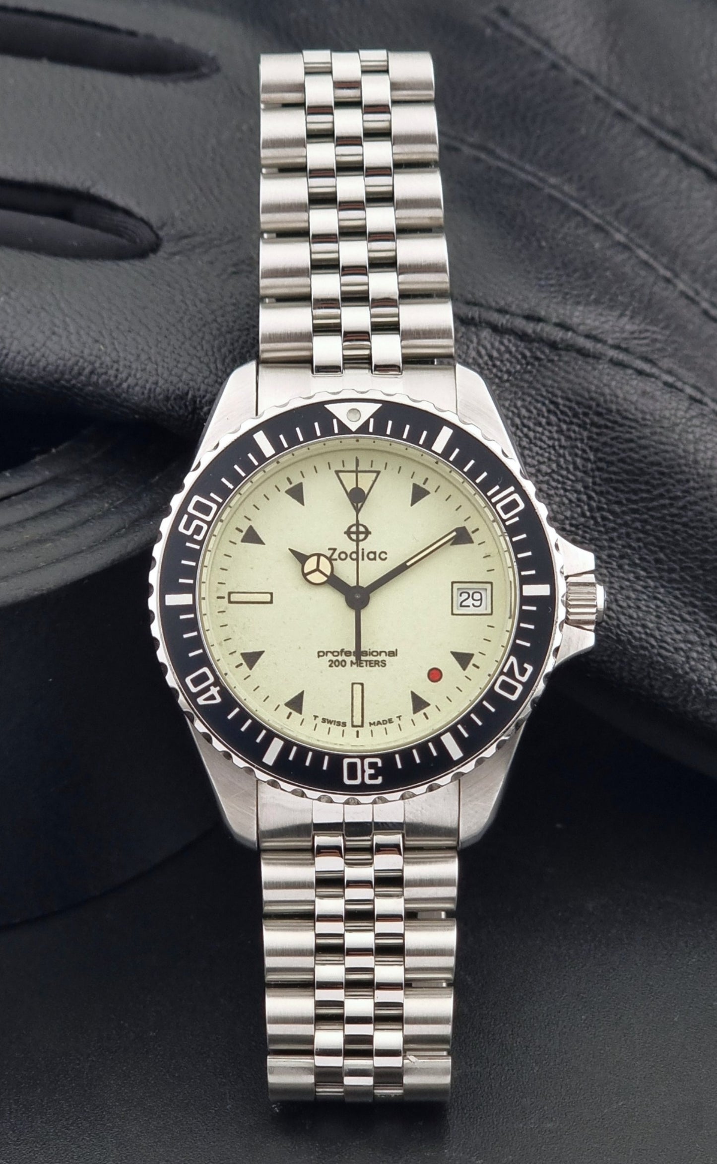 Vintage Zodiac Wristwatch 113.21.07 Quartz Red Dot Night Diver with a detailed face on a dark background dial view