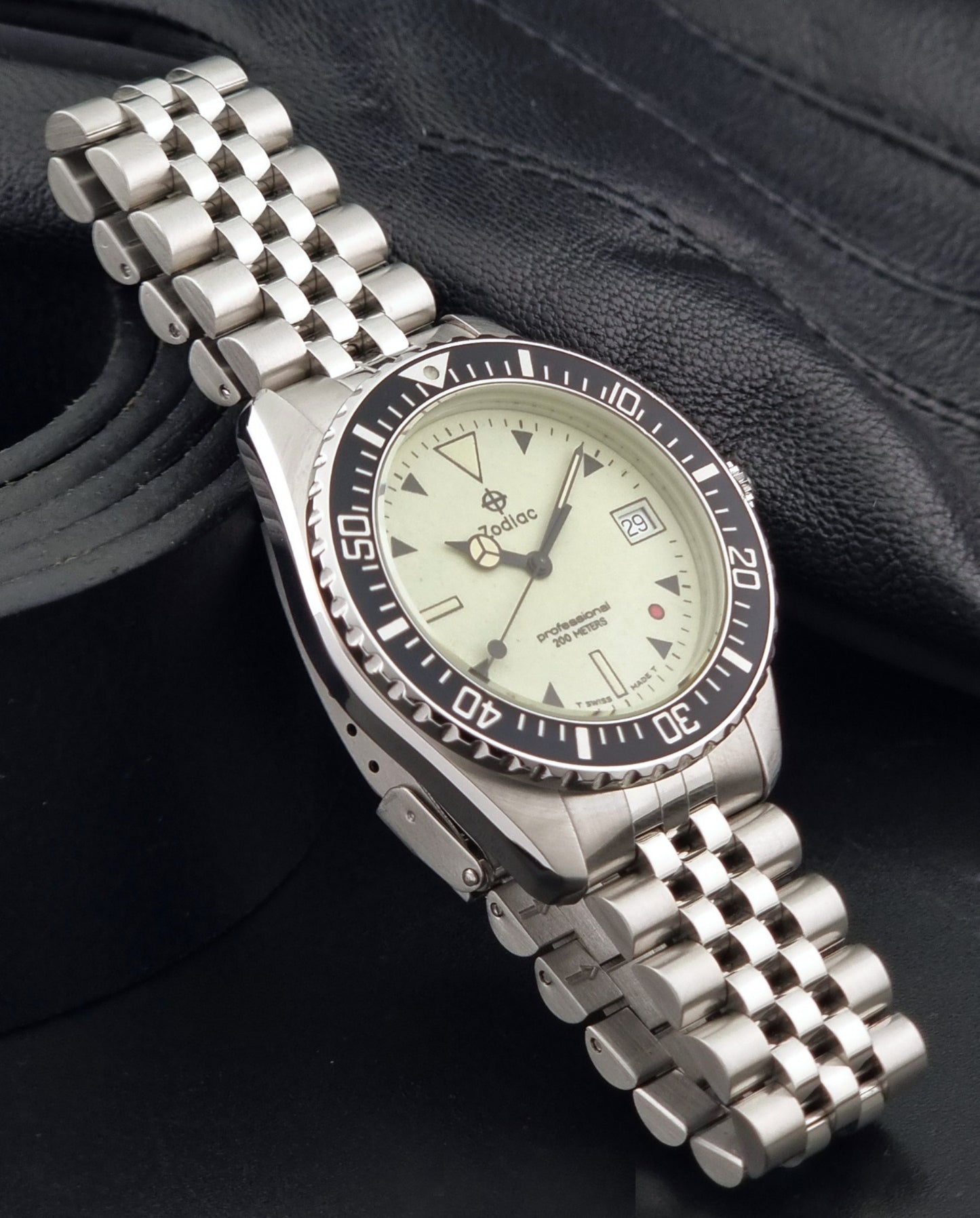 Vintage Zodiac Wristwatch 113.21.07 Quartz Red Dot Night Diver with a detailed face on a dark background side view