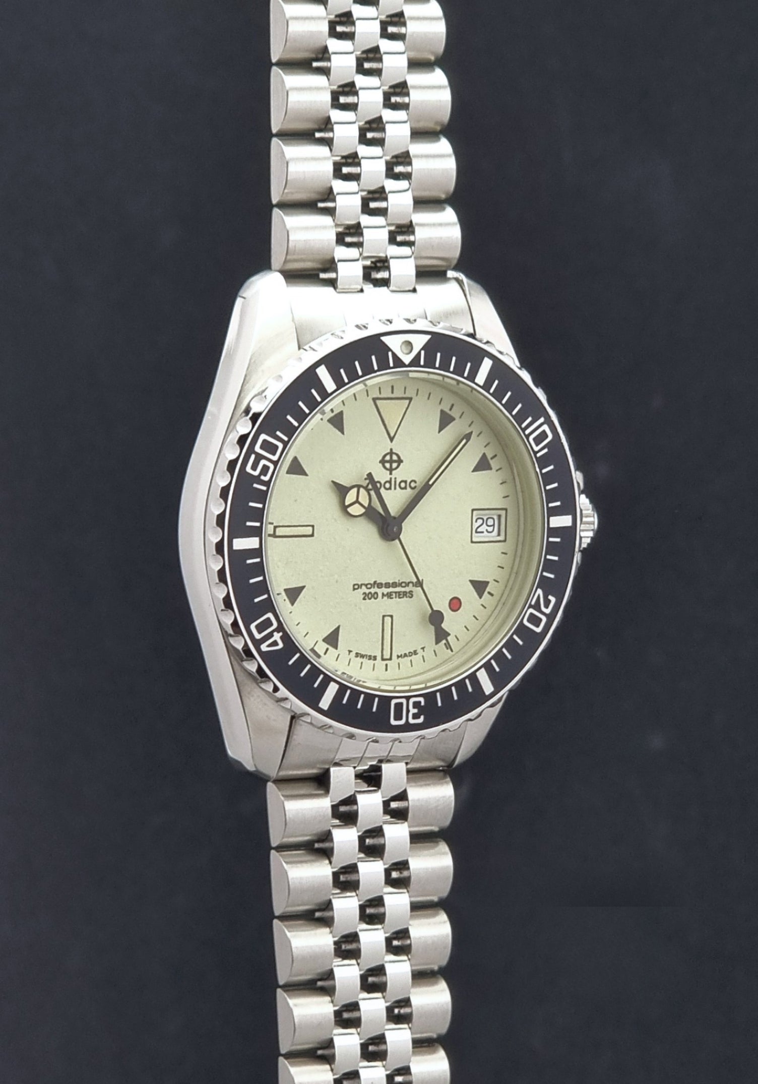 Vintage Zodiac Wristwatch 113.21.07 Quartz Red Dot Night Diver with a detailed face on a dark background side profile view